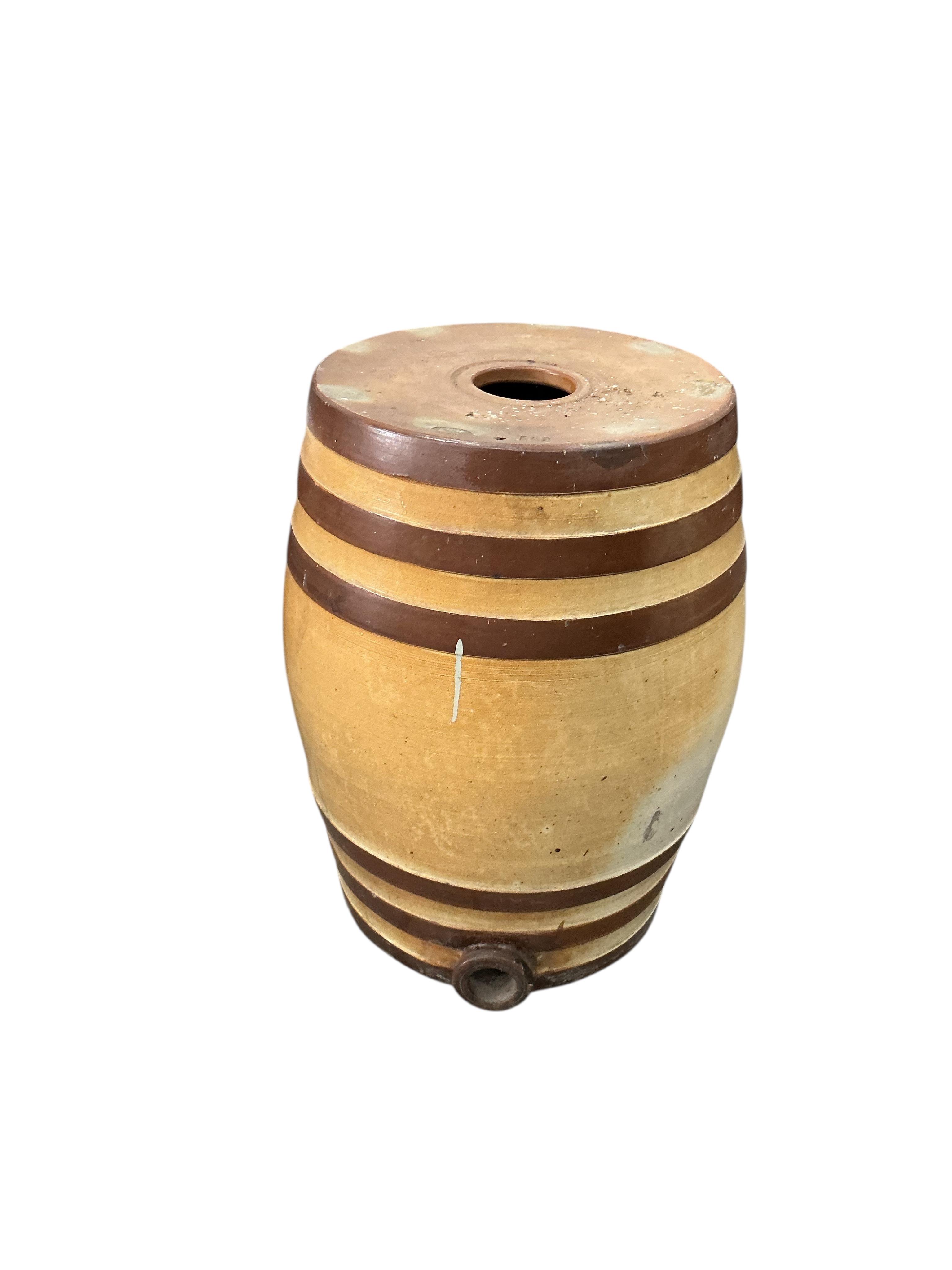 Two Victorian Doulton and Watts salt-glazed stoneware barrels, larger diameter 46cm, height 68cm, Provenance: The late Kenneth Turner (1936-2025), celebrity florist, designer and perfume retailer, he received the Royal W